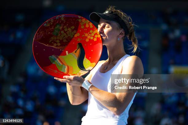 Liudmila Samsonova of Russia poses with the champions trophy after defeating Qinwen Zheng of China in the final match on Day 7 of the Toray Pan...