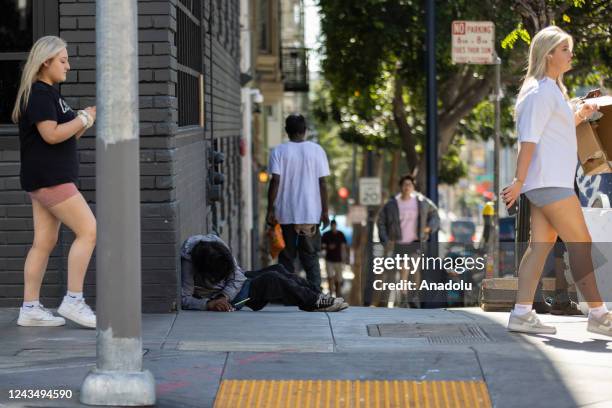 Homeless people are seen in Tenderloin district of San Francisco in California, United States on September 24, 2022.