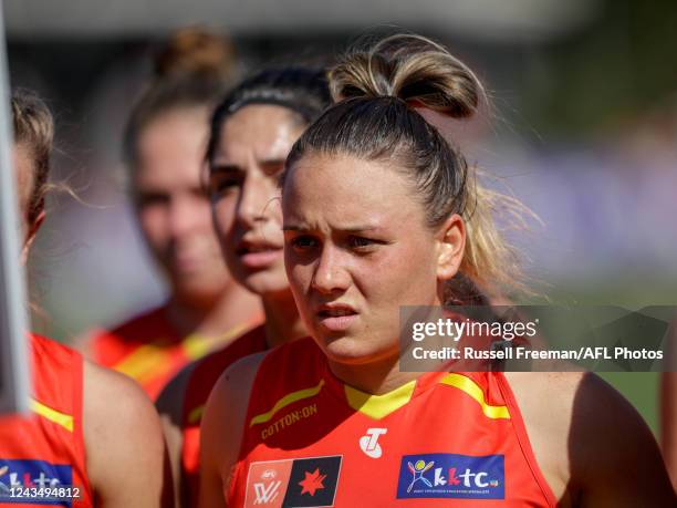 Ellie Hampson of the Suns is seen during the three-quarter time huddle during the 2022 S7 AFLW Round 05 match between the Gold Coast Suns and the...