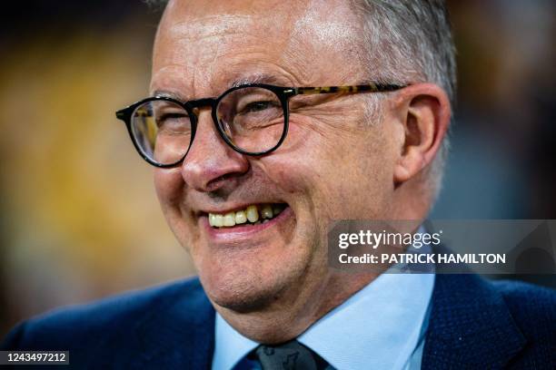 Australia's Prime Minister Anthony Albanese reacts before the international women's rugby league match between Australia and Papaua New Guinea at the...