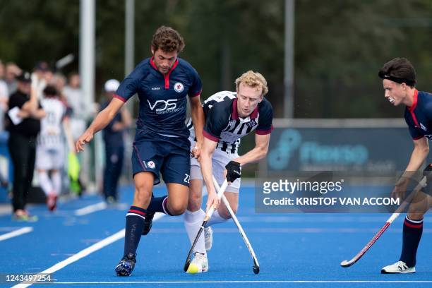 Leuven's Pere Divorra and Herakles' Amaury Keusters pictured in action during a hockey game between Royal Herakles Hockey Club and Royal Hockey Club...