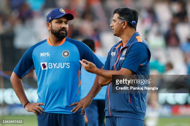 Rohit Sharma of India and Rahul Dravid head coach of India prior to game three of the T20 International series between India and Australia at Rajiv...