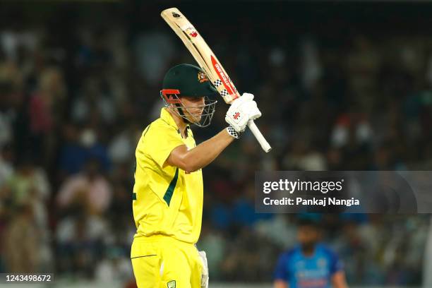 Cameron Green of Australia celebrates after scoring a fifty during game three of the T20 International series between India and Australia at Rajiv...