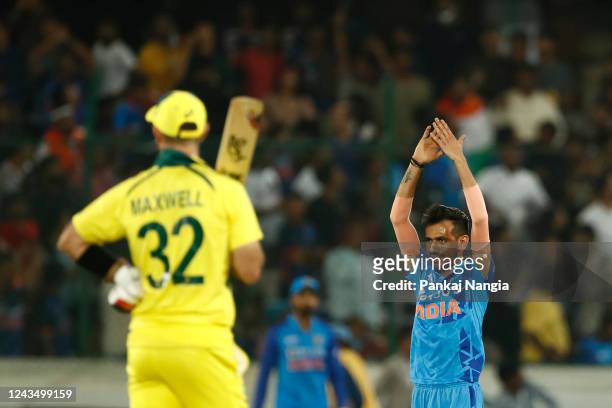 Yuzvendra Chahal of India celebrates the run out of Glenn Maxwell of Australia during game three of the T20 International series between India and...