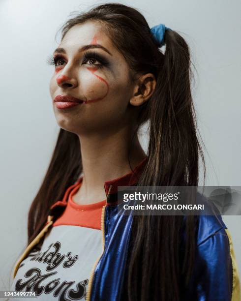 South African cosplayer Avi Buldeo dressed as the fictional character Harley Quinn poses for a portrait at the 2022 Comic Con Africa, the largest pop...