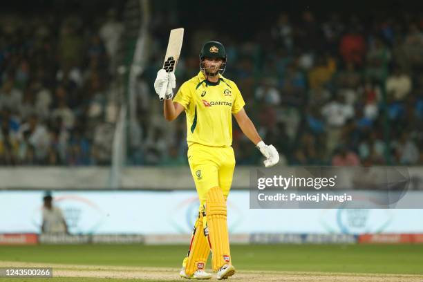 Tim David of Australia celebrates after scoring a fifty during game three of the T20 International series between India and Australia at Rajiv Gandhi...