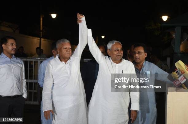 Bihar CM Nitish Kumar with RJD Chief Lalu Prasad Yadav after meeting Congress leader Sonia Gandhi at her residence on Akbar Road, emphasising the...