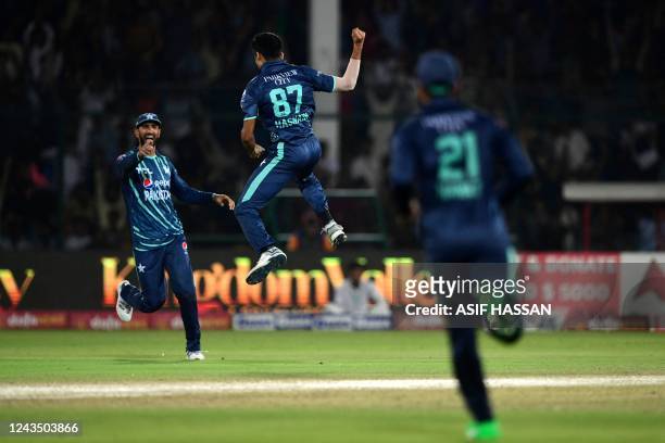 Pakistan's players celebrate after the dismissal of England's Will Jacks during the fourth Twenty20 international cricket match between Pakistan and...
