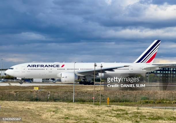 An Air France Boeing 777 sits at Roissy Charles de Gaulle airport, in the northeastern outskirts of Paris, on September 25, 2022.