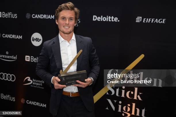 Belgium's Tom Boon winner of the golden stick trophee poses for the photographer at a ceremony to award the 'Golden Sticks' for the best players of...