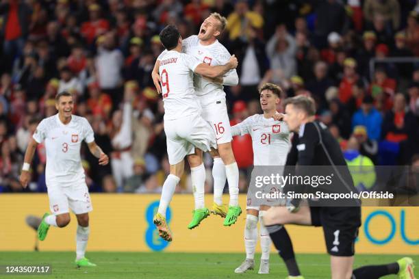 Karol Swiderski of Poland celebrates scoring their first goal with Robert Lewandowski during the UEFA Nations League League A Group 4 match between...