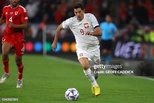 Poland's striker Robert Lewandowski runs with the ball during the UEFA Nations League, league A group 4 football match between Wales and Poland at...