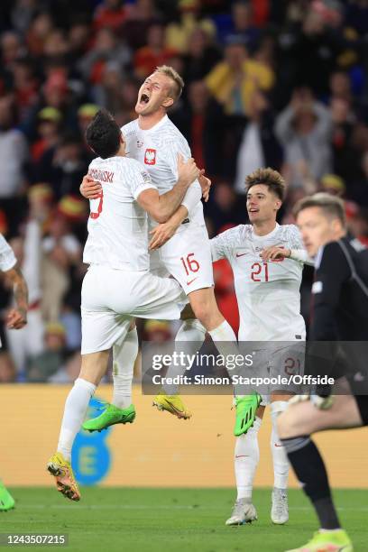 Karol Swiderski of Poland celebrates scoring their first goal with Robert Lewandowski during the UEFA Nations League League A Group 4 match between...