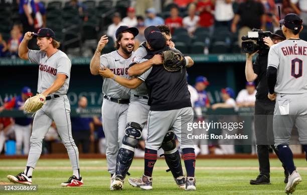 The Cleveland Guardians react after defeating the Texas Rangers 10-4 and clinching the American League Central Division at Globe Life Field on...