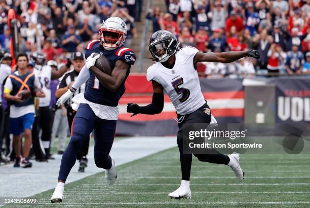 Baltimore Ravens cornerback Jalyn Armour-Davis catches New England Patriots wide receiver DeVante Parker during a game between the New England...