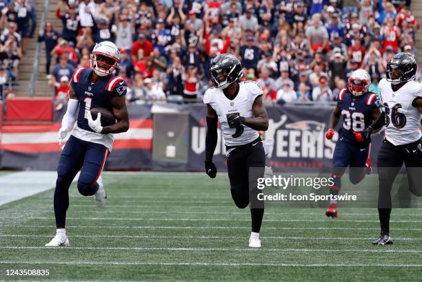 New England Patriots wide receiver DeVante Parker runs away from Baltimore Ravens cornerback Jalyn Armour-Davis during a game between the New England...