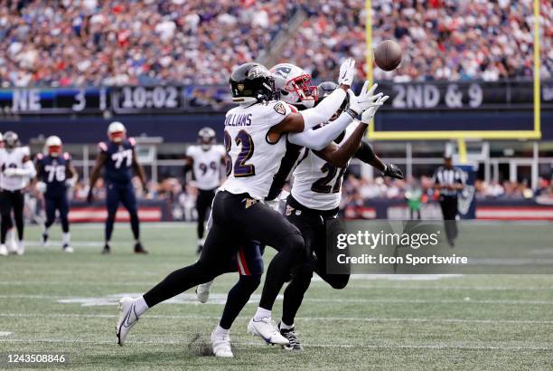 Baltimore Ravens safety Marcus Williams and cornerback Brandon Stephens double team New England Patriots wide receiver DeVante Parker during a game...