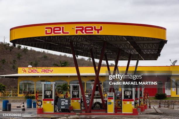 This photograph taken on August 31, 2022 in Lencois, Bahia state, Brazil, shows a Del Rey petrol station. A vintage pump in the Vietnamese hills; a...