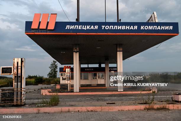 This photograph taken on July 24, 2022 outside the village of Kon'-Kolodez' in the Lipetsk region, Russia, shows an abandoned petrol station of...