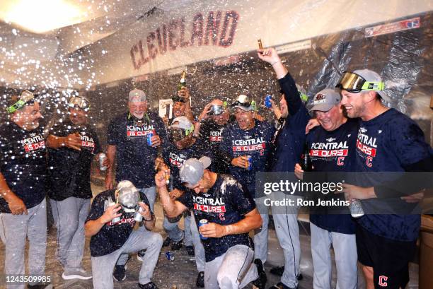 The Cleveland Guardians celebrate after defeating the Texas Rangers 10-4 and clinching the American League Central Division at Globe Life Field on...