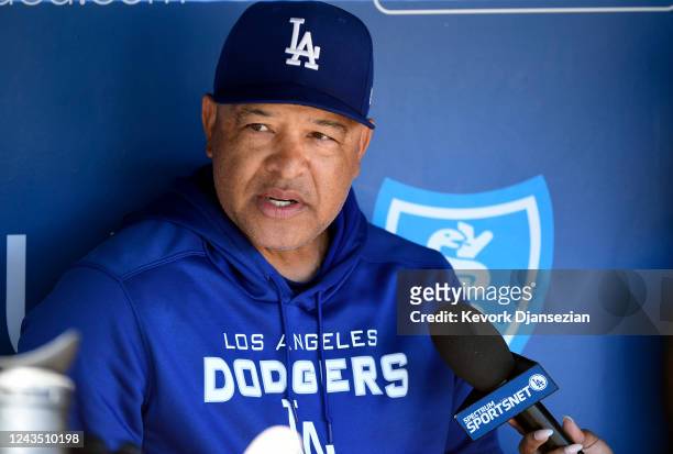 Manager Dave Roberts of the Los Angeles Dodgers speaks to the media during a news conference before the start of the game against the St. Louis...