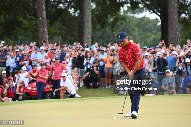 Xander Schauffele of the United States Team putts during the final round Sunday singles matches of Presidents Cup at Quail Hollow September 25 in...