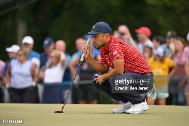 United States Team Member Xander Schauffele lines up a putt on the 17th hole during the final round Sunday singles matches of Presidents Cup at Quail...