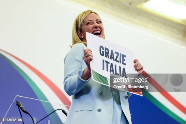 Giorgia Meloni, leader of the Brothers of Italy party, reacts at the party's general election night event in Rome, Italy, on Monday, Sept. 26. 2022....