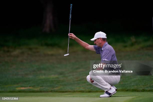 Steven Alker of New Zealand lines up a putt on the thirteenth green during the Final Round of the PURE Insurance Championship at Pebble Beach Golf...