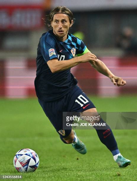Croatia's midfielder Luka Modric runs with the ball during the UEFA Nations League Group 1 football match betwen Austria and Croatia in Vienna on...