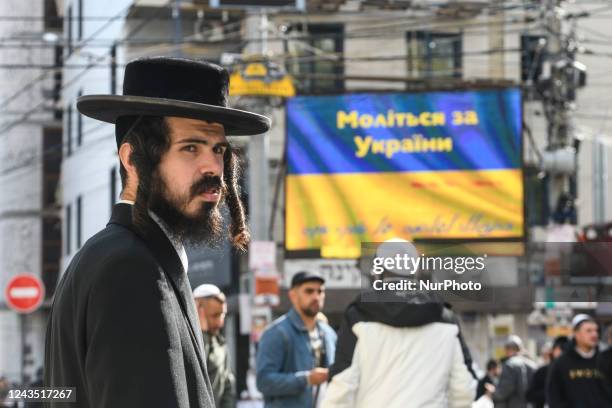 Orthodox Jewish pilgrims on the street near the tomb of Rabbi Nachman while celebrating Rosh Hashanah, the Jewish New Year, amid Russia continues the...