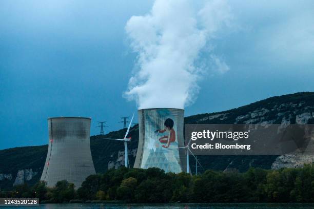 Vapor rises from cooling tower in the Cruas Nuclear Power Plant, operated by Electricite de France SA , in Cruas, France, on Saturday, Sept. 24,...