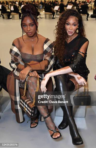 Normani and Winnie Harlow attend the Burberry Spring/Summer 2023 runway show in Bermondsey on September 26, 2022 in London, England.