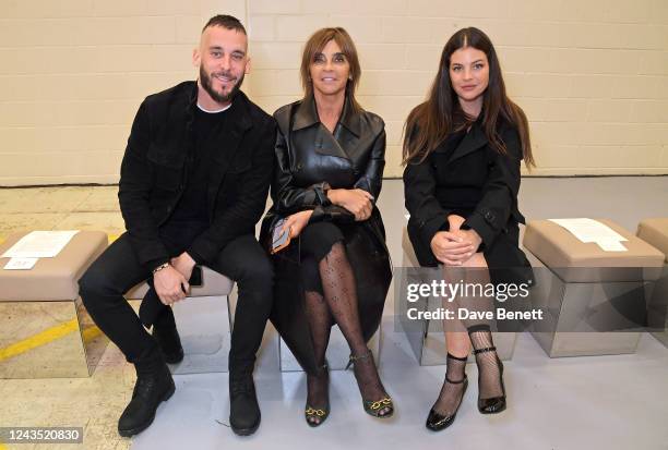 Vladimir Restoin Roitfeld, Carine Roitfeld and Julia Restoin Roitfeld attend the Burberry Spring/Summer 2023 runway show in Bermondsey on September...