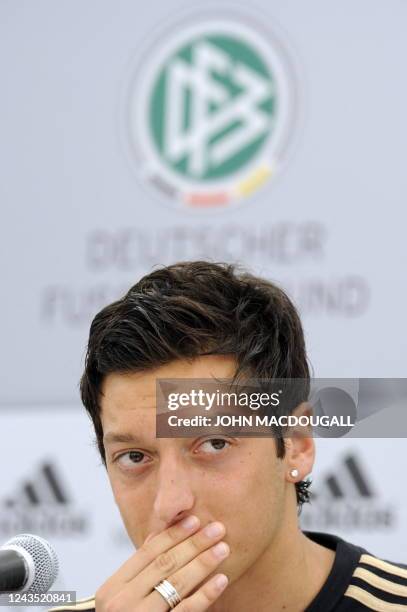 Germany's midfielder Mesut Oezil addresses a press conference in Appiano, near the north Italian city of Bolzano May 25, 2010. The German football...