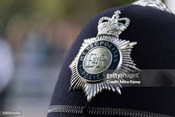 Metropolitan Police badge on a male policeman's helmet on 14th September 2022 in London, United Kingdom. The Metropolitan Police Service, formerly...