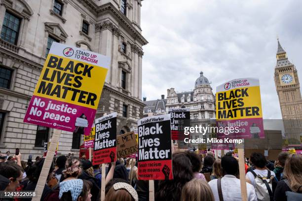 Black Lives Matter Demonstration passes through Westminster near the Houses of Parliament following the death of Chris Kaba who was shot and killed...