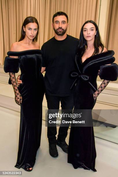 Irina Shayk, CCO of Burberry Riccardo Tisci and Mariacarla Boscono pose backstage at the Burberry Spring/Summer 2023 runway show in Bermondsey on...