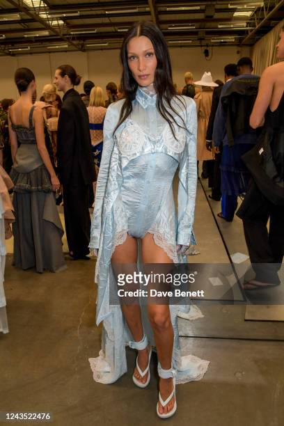 Bella Hadid poses backstage at the Burberry Spring/Summer 2023 runway show in Bermondsey on September 26, 2022 in London, England.