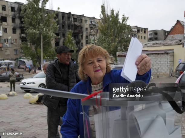 People cast their votes in controversial referendums in Mariupol, Donetsk Oblast, Ukraine on September 26, 2022. Voting runs from Friday to Tuesday...
