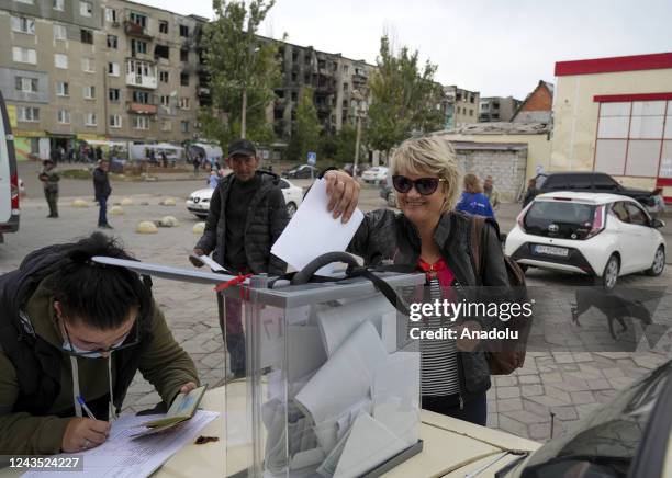 People cast their votes in controversial referendums in Mariupol, Donetsk Oblast, Ukraine on September 26, 2022. Voting runs from Friday to Tuesday...