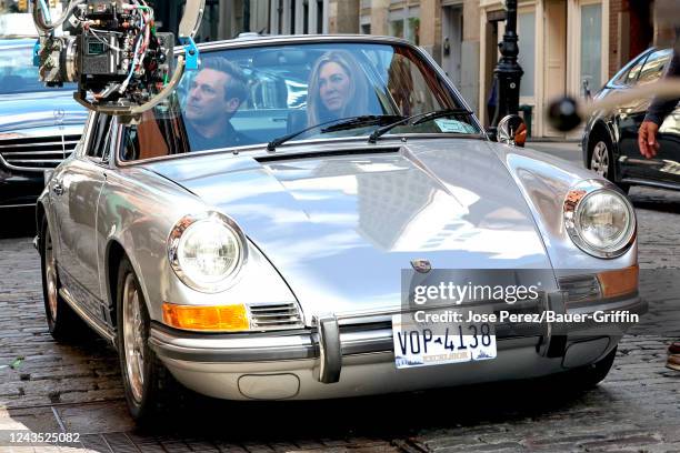 Jon Hamm and Jennifer Aniston are seen filming at 'The Morning Show' on September 26, 2022 in New York City.