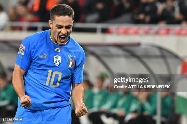 Italy's forward Giacomo Raspadori celebrates scoring during the UEFA Nations League Group 3 football match between Hungary and Italy in Budapest on...
