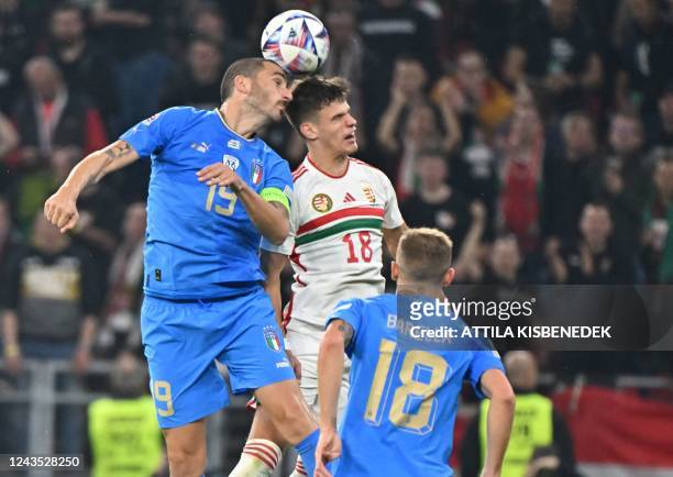 Italy's defender Leonardo Bonucci and Hungary's defender Milos Kerkez vie for the ball during the UEFA Nations League Group 3 football match between...