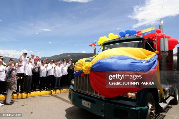 Colombian President Gustavo Petro next to Venezuelan Transport Minister Ramon Velasquez and Tachira State Governor Freddy Bernal watch as the first...