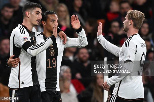 Germany's midfielder Kai Havertz celebrates scoring the team's second goal with Germany's striker Leroy Sane and Germany's striker Timo Werner during...