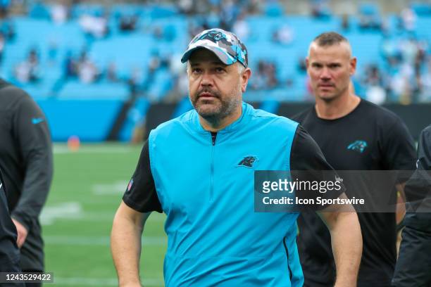 Head Coach Matt Rhule of the Carolina Panthers walks off of the field after his first win of the season after a football game between the Carolina...