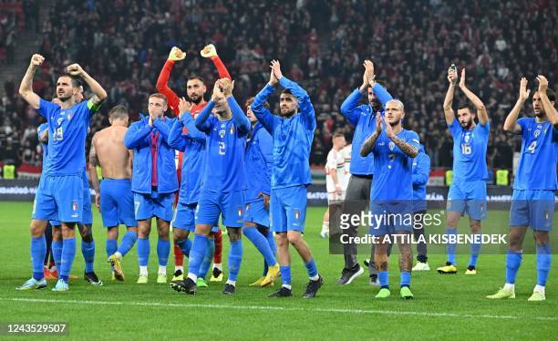 Italy's players celebrate after the UEFA Nations League Group 3 football match between Hungary and Italy in Budapest on September 26, 2022.
