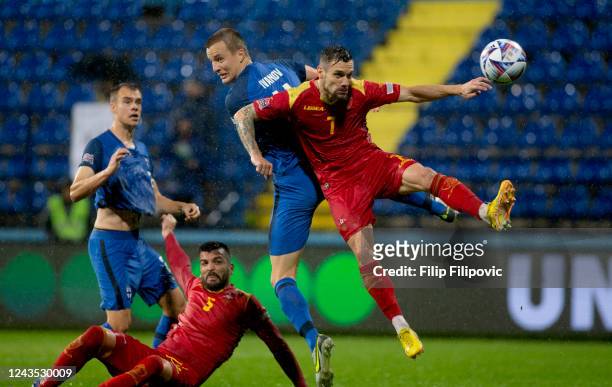 Robert Ivanov of Finland and Marko Vesovic of Montenegro during the UEFA Nations League League B Group 3 match between Montenegro and Finland at...