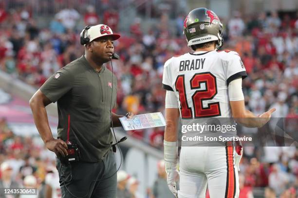 Tampa Bay Buccaneers Offensive Coordinator Byron Leftwich talks quarterback Tom Brady during the regular season game between the Green Bay Packers...